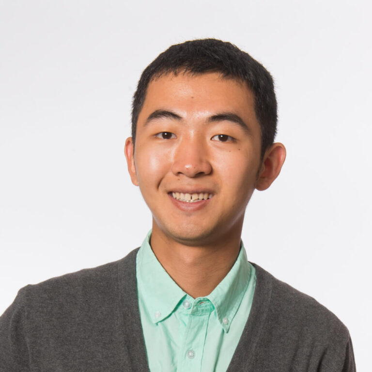Headshot of former graduate student Yanfeng He